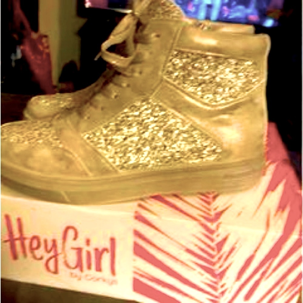 Woman’s size 10 Corkys Notorious sneakers gold metallic